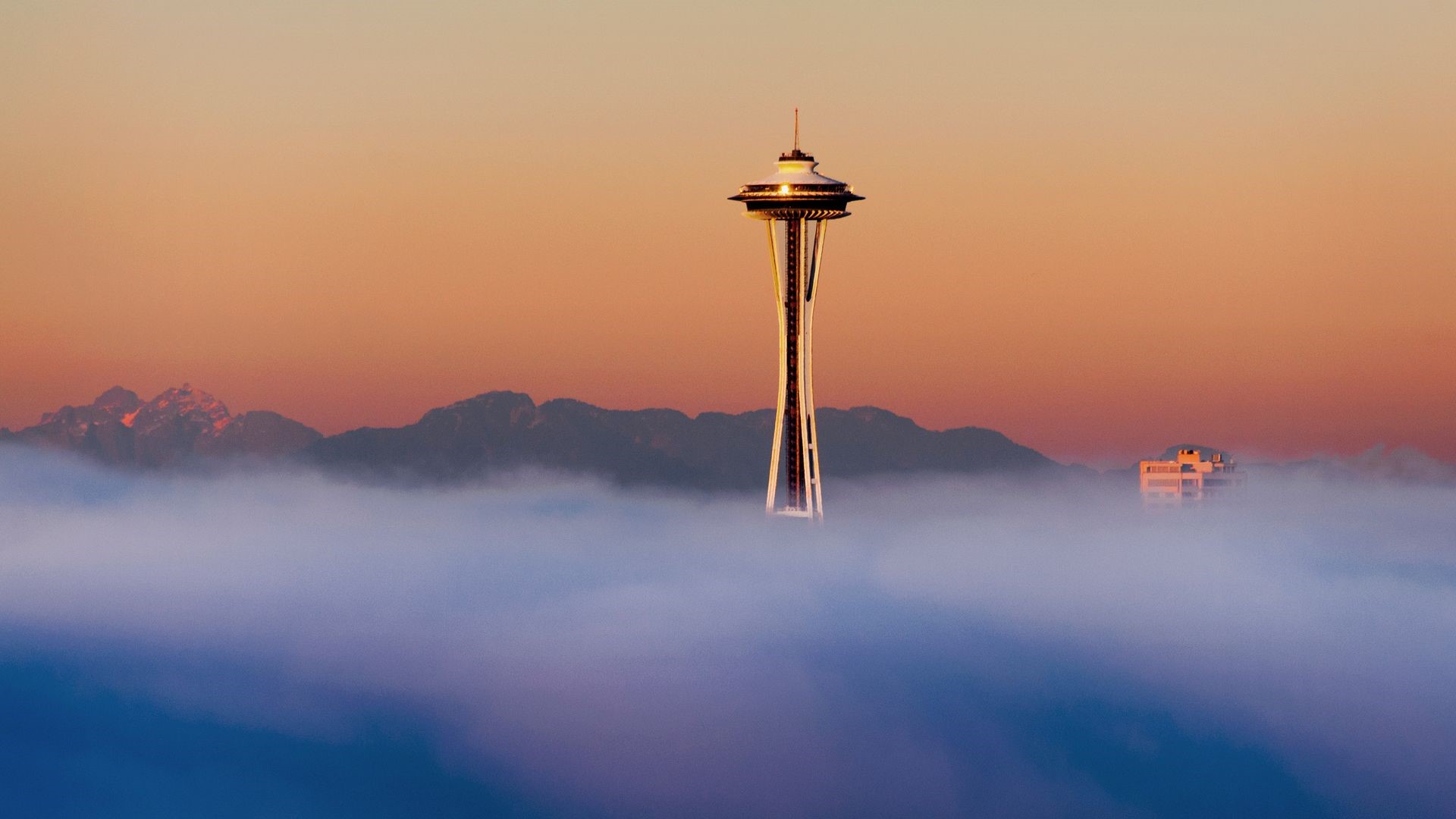 space needle in the clouds